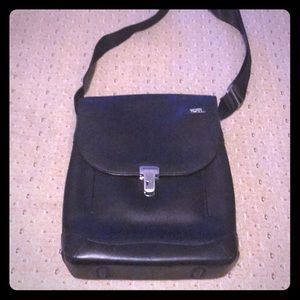Black leather TUMI pocket bag